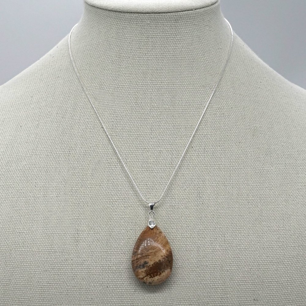 Genuine Jasper with silver rope link chain.